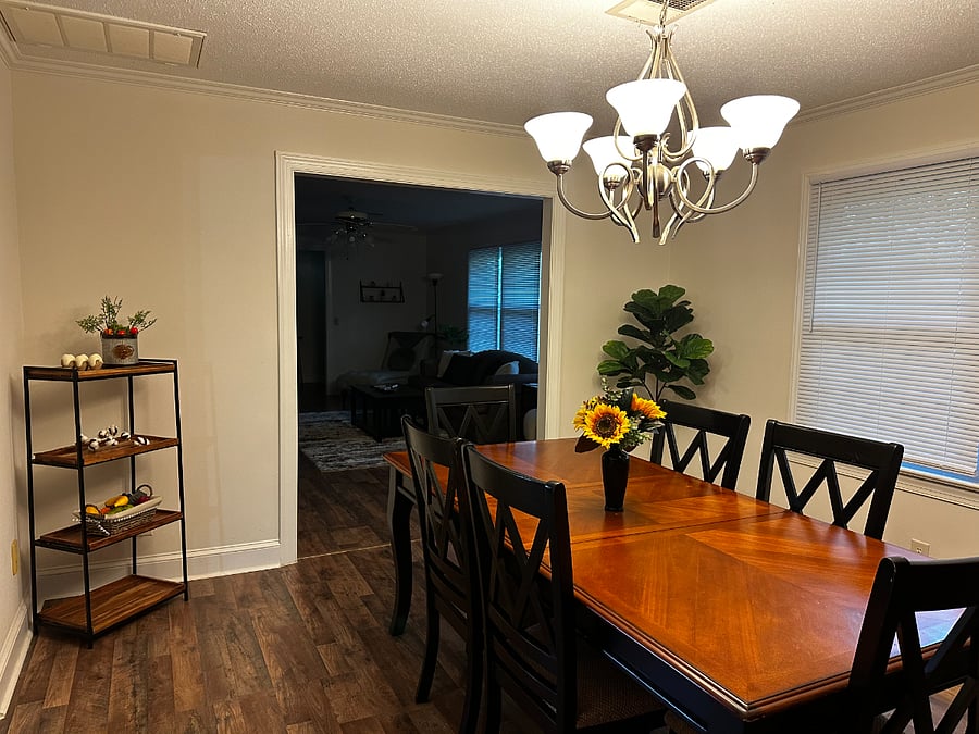 Formal dining room just off the kitchen and adjacent to the formal living room. 