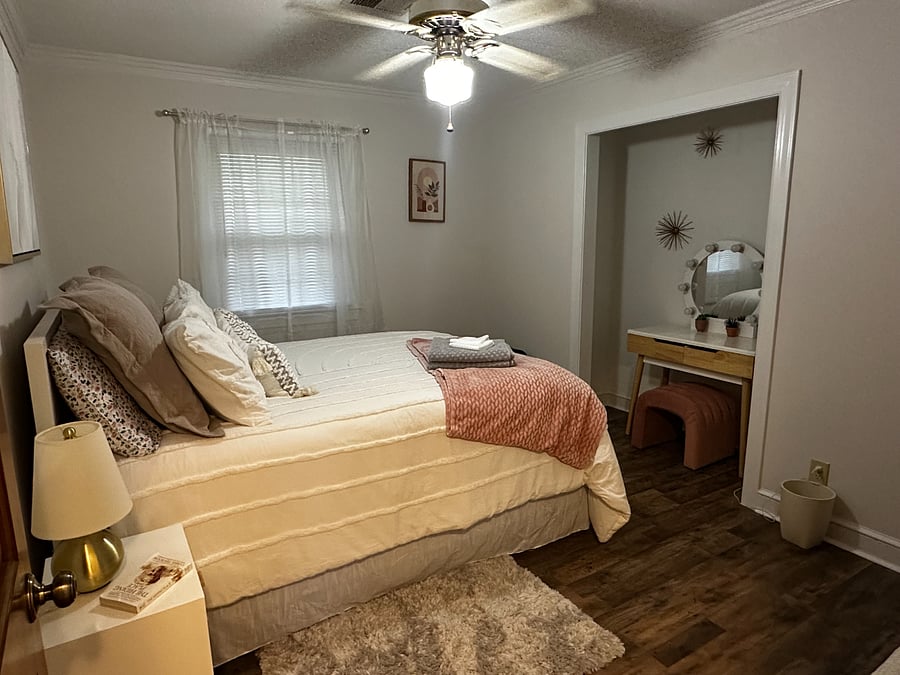 Bedroom 1 was decorated by our daughter with a bohemian theme.  There is a queen bed, small vanity and full sized mirror.
