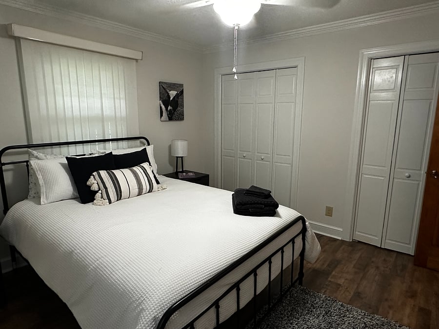 Bedroom 2 is a more neutral black and white theme featuring the goats.  There are two closets, each including built in cubes and hanging areas to accommodate the needs of the occupant in bedroom 1 if needed. 