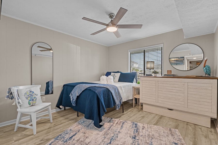 Queen bedroom with one queen bed and one queen-sized Murphy bed in a cabinet