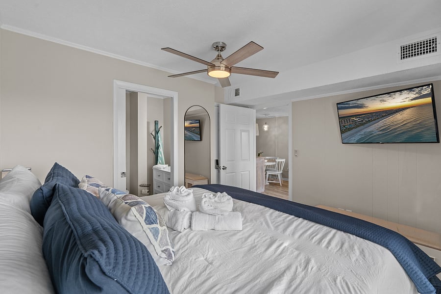 King sized bedroom with smart TV
