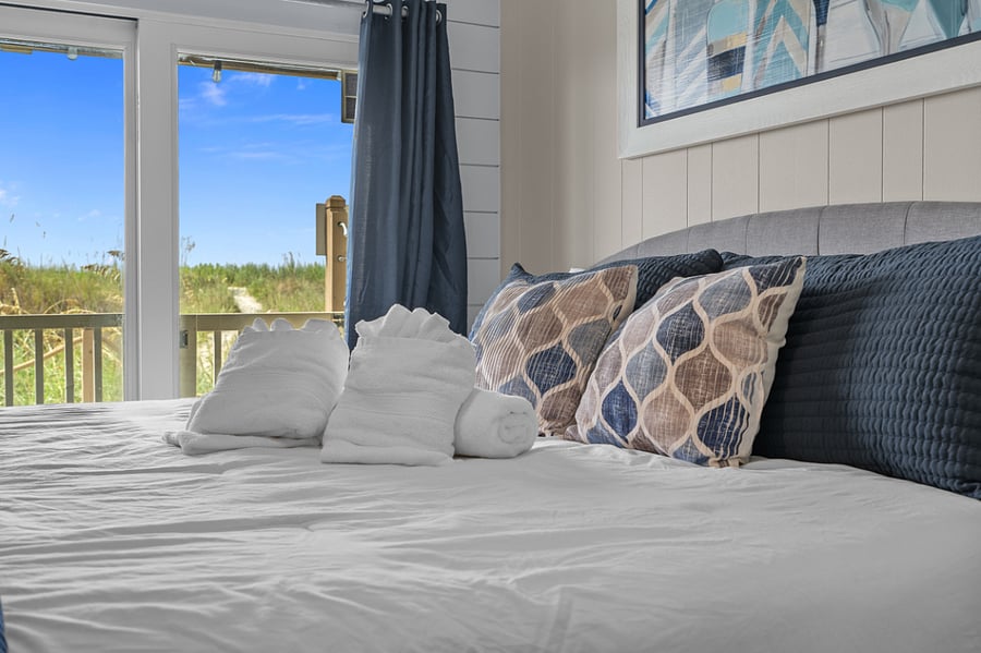 King bedroom with 3 inch mattress topper and comfy pillows