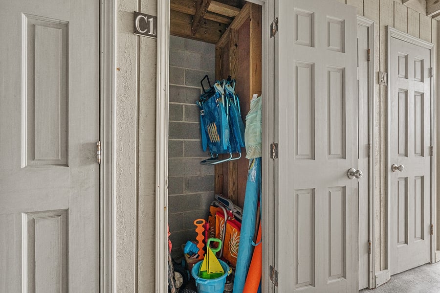 Outdoor storage closet with beach essentials