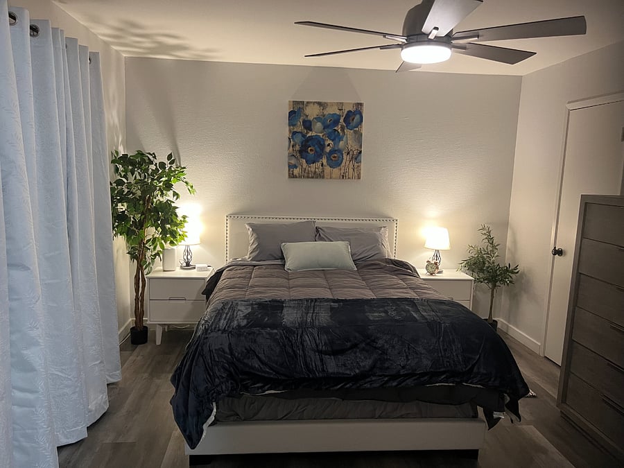 Downstairs bedroom with queen bed