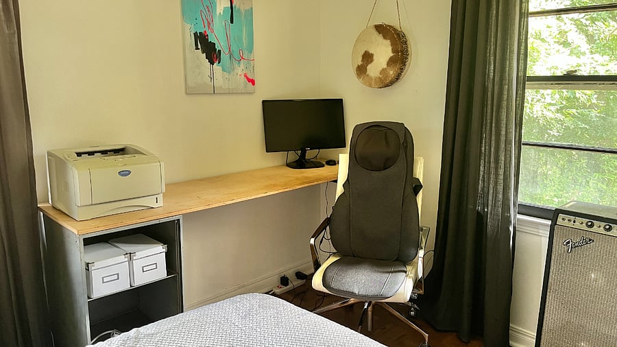 A desk for remote workers. Feel free to use the computer monitor and printer.