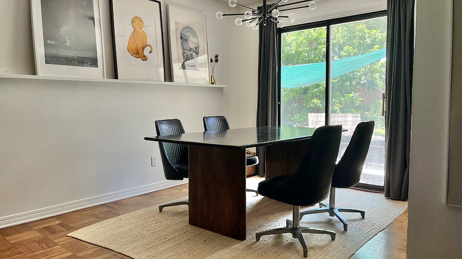 Spacious dining room looking onto the beautiful patio!