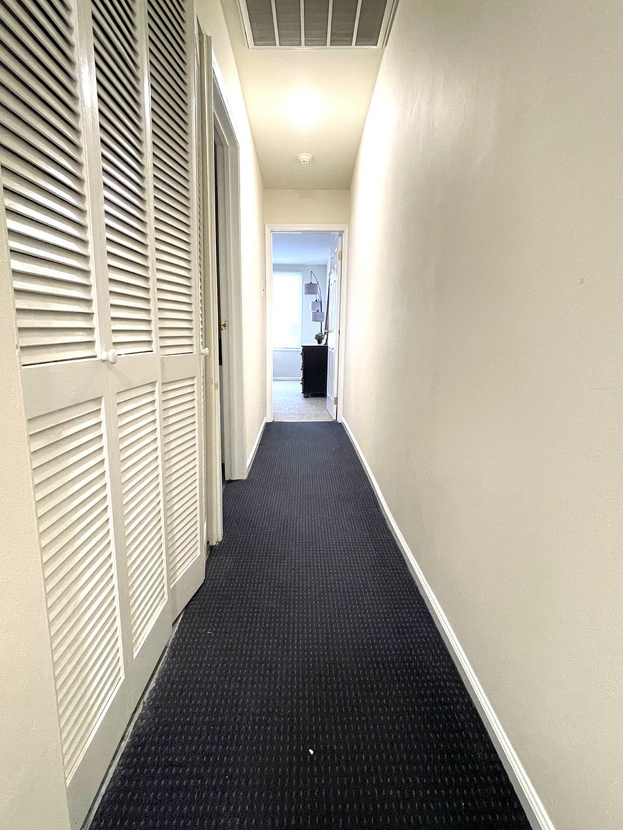 Hallway with utility closet for Laundry