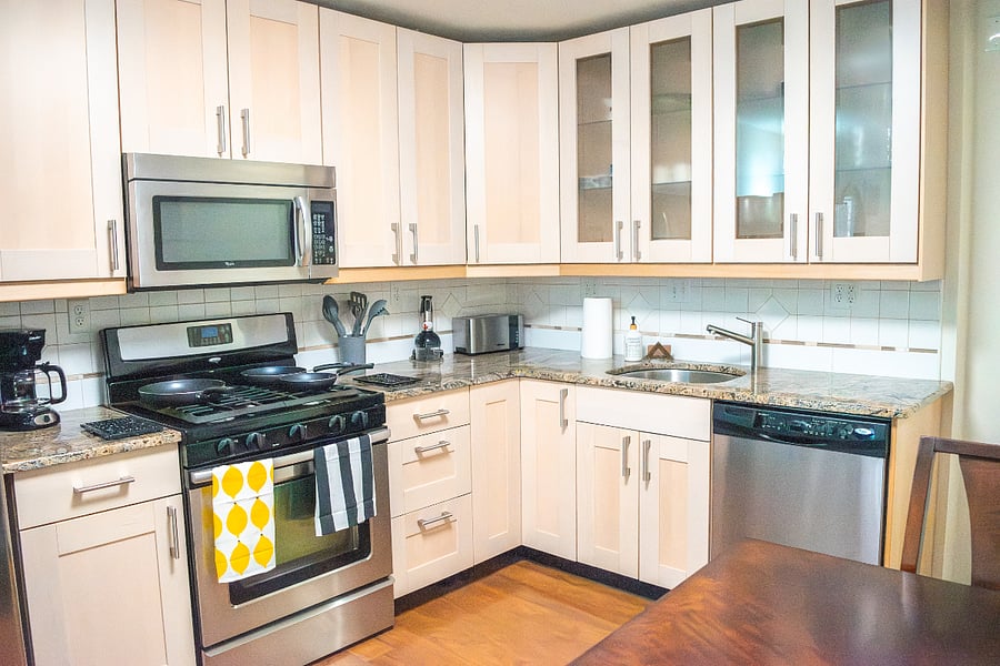 Kitchen stocked with all the necessary cooking/dining supplies