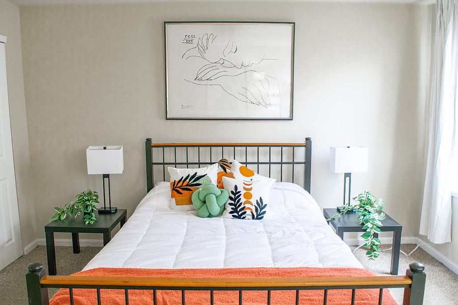 Front bedroom with brand new queen mattress, large closets, blackout curtains, charging lamps, full length mirror.