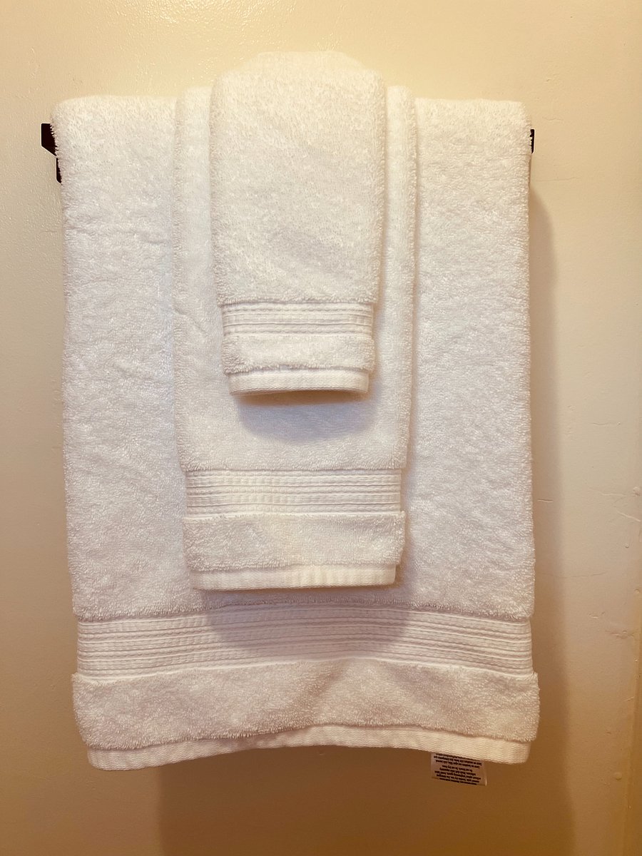You'll find a fresh set of clean towels neatly stored in the closet, ensuring you have everything you need for a comfortable stay.