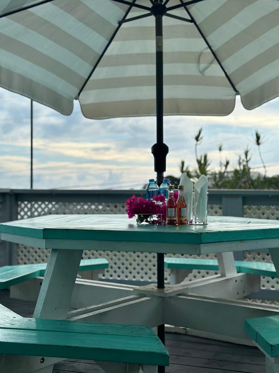Take in what your group needs under the shade of a large umbrella with sails on our expansive deck area. Cool off during the day, relax in the afternoons, and hydrate with complimentary water upon arrival to the suite