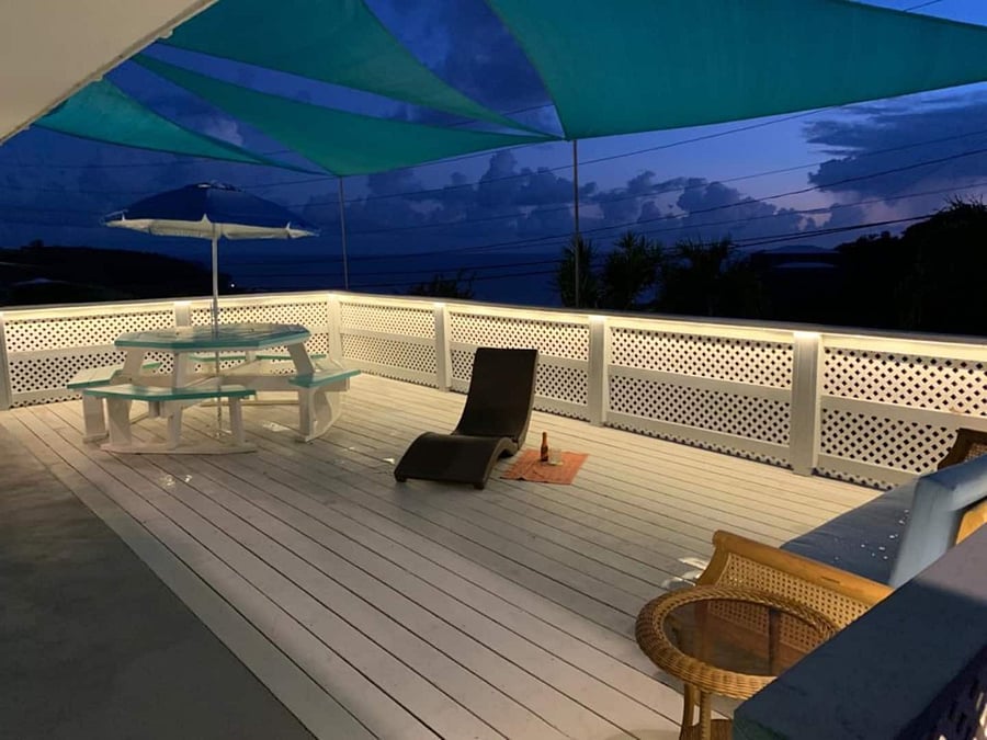 Enjoy sunsets from the deck, additional lighting and seating for several guests