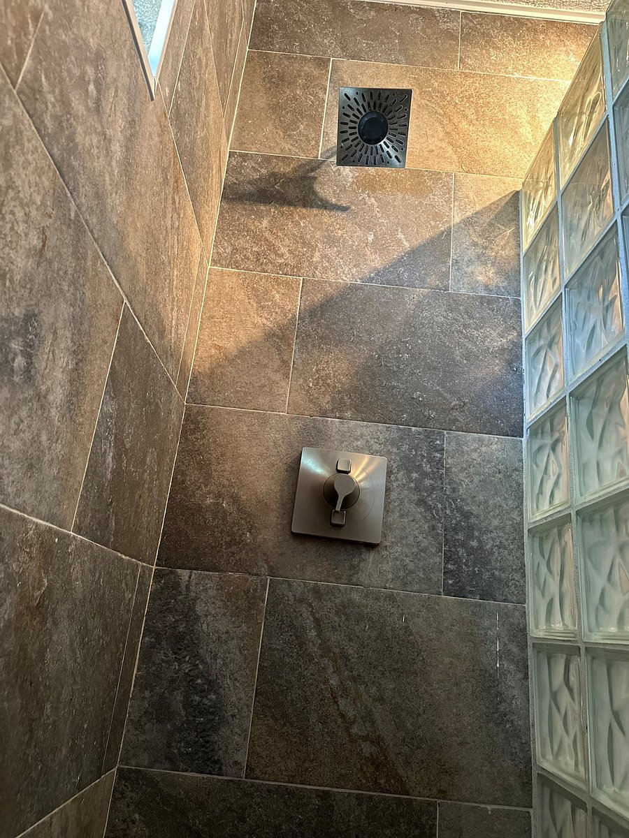 Rainfall spray pattern with cistern water creates a rejuvenating spa-like experience after a day of exploring our island. Please be sure to wash off sand prior to entering the suite