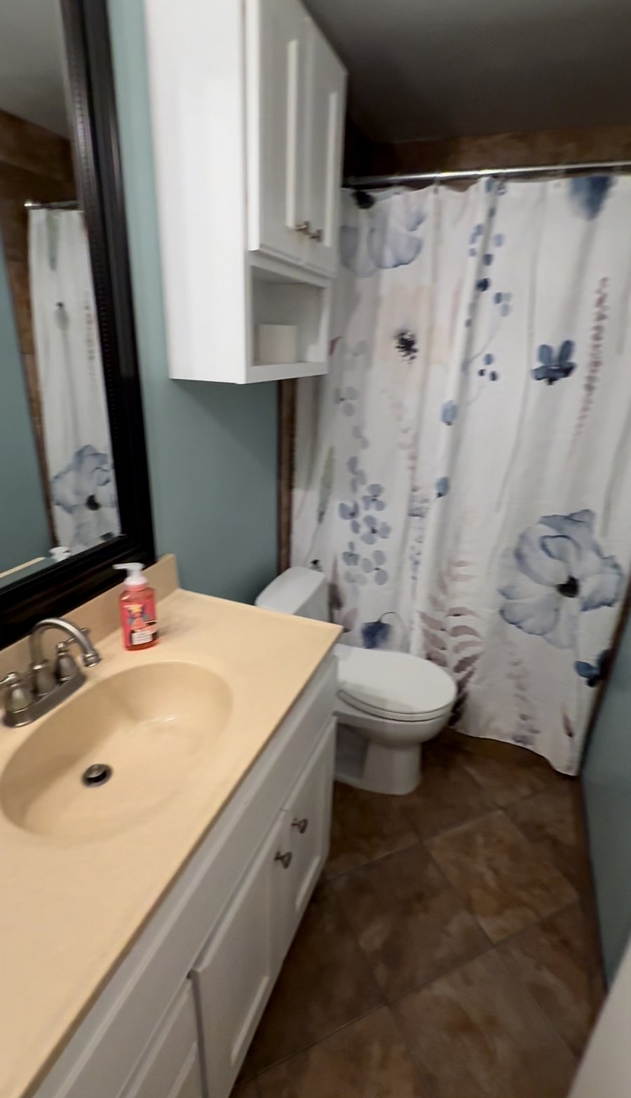 Private bath - King Room - full shower, sink, toilet, window, tiled shower and floor.