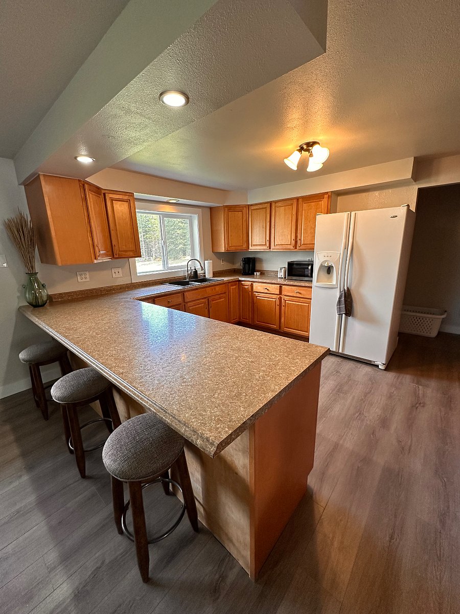 A full kitchen with fridge/freezer, dishwasher, microwave, toaster, keurig, and more!