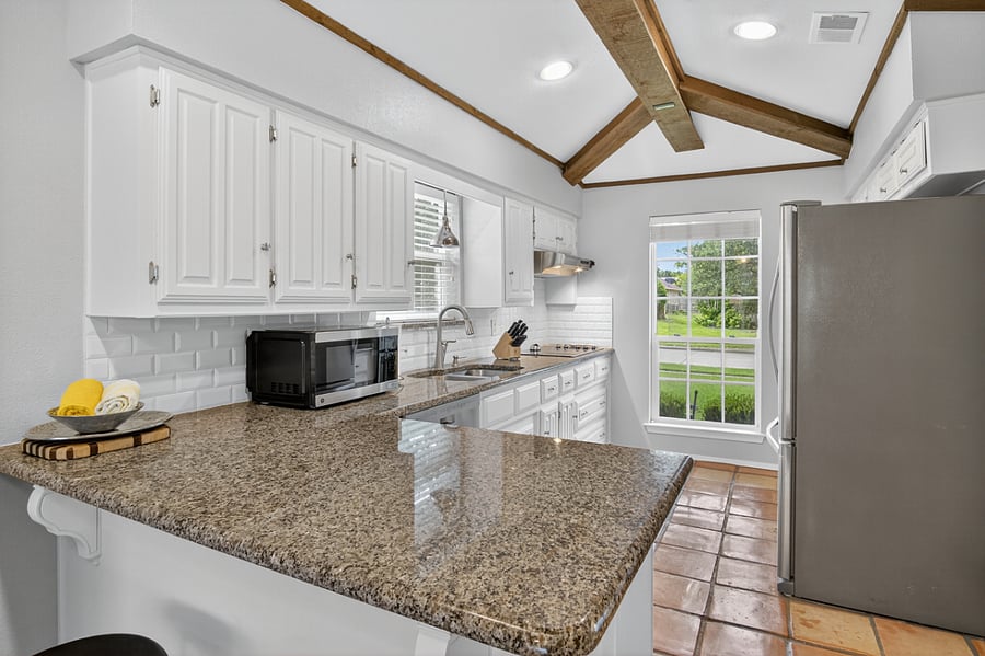 +Full kitchen with cooking essentials
+Electric cooktop with ventahood
+Double oven
+Full sized refrigerator freezer
+Dishwasher