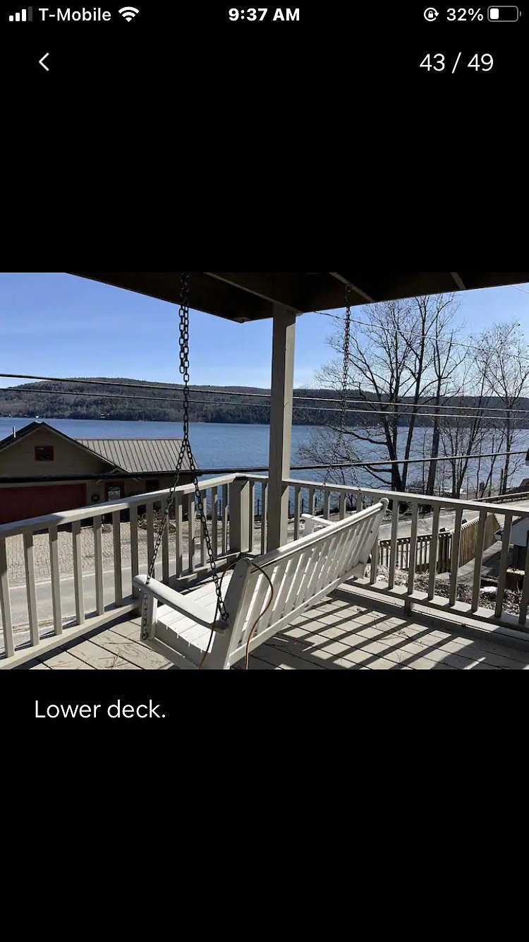View of lake right outside your two oversized sliding glass doors off of your open living room!