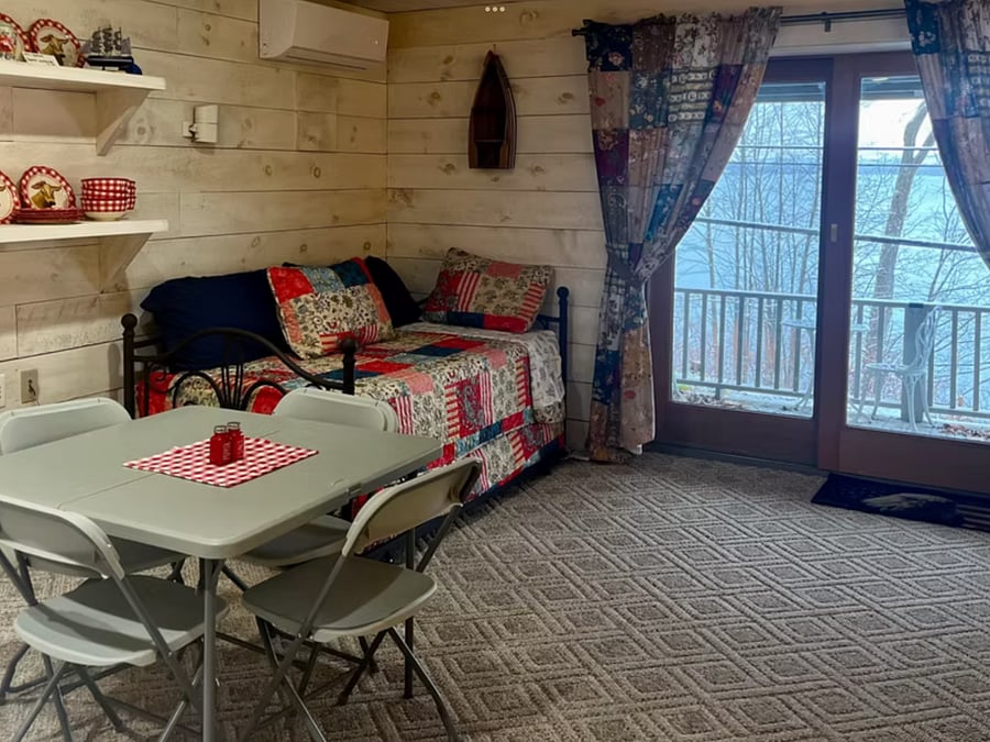 Notice the water view out the oversized sliding glass doors. Its breathtaking all year. Trundle unit for extra people to sleep.