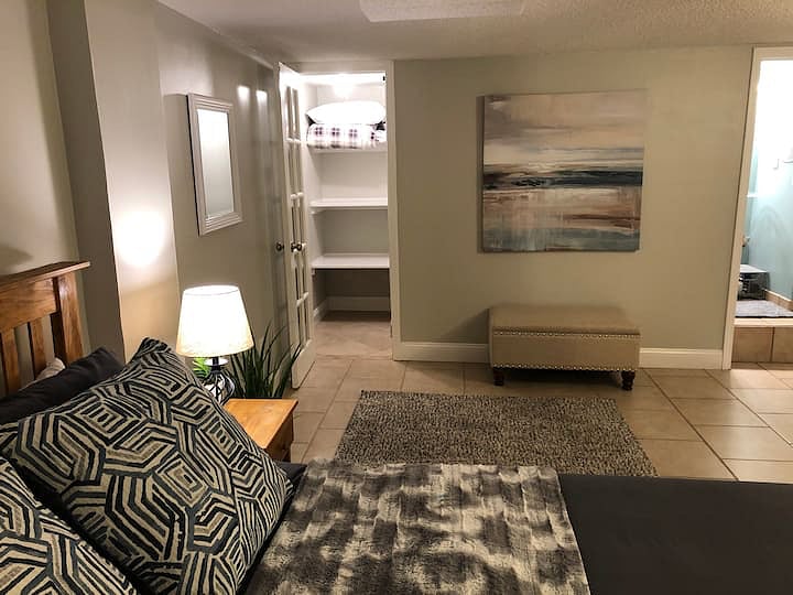 Master bedroom with smaller closet, bath and sitting area