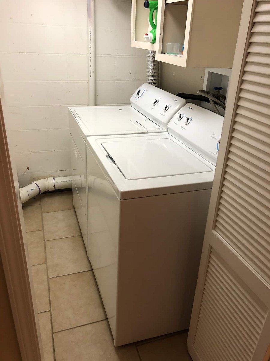 Laundry room. Its an old school washer and dryer but they get the job done