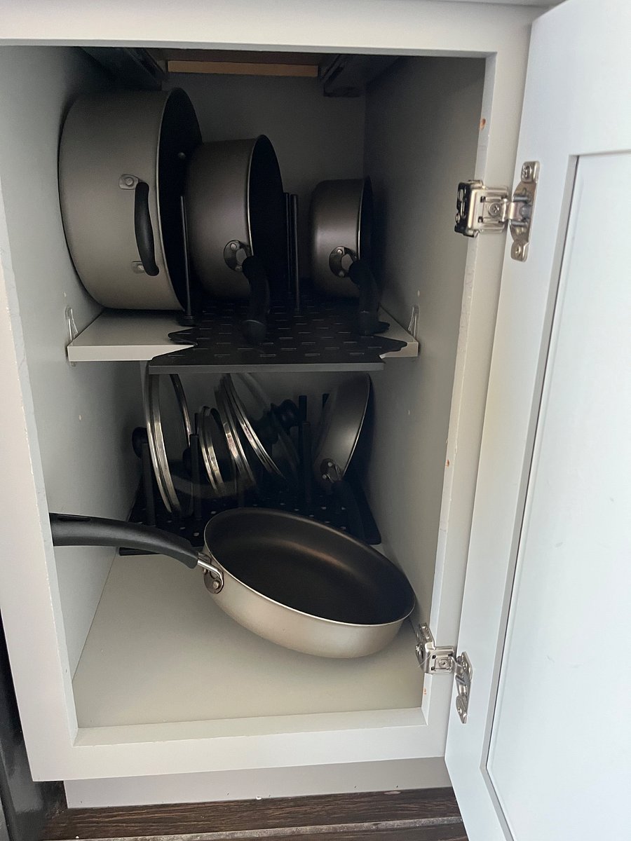 This unit comes with a set of pots and pans and basic cooking amenities.