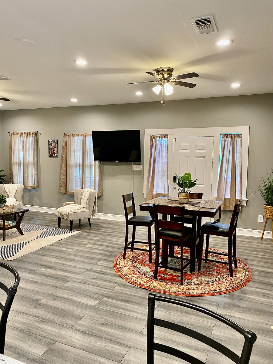 Open Floor plan. Separate dining area with mounted smart tv's.
