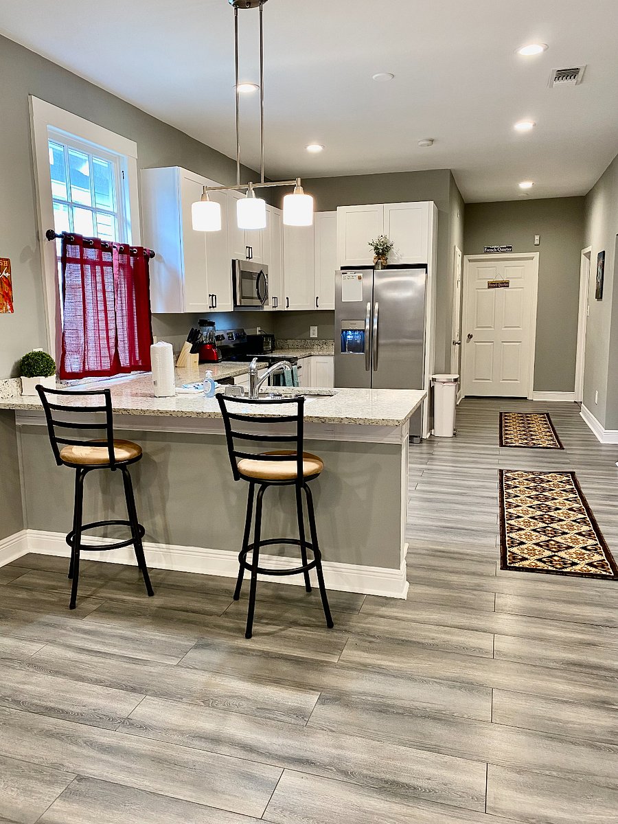 Spacious kitchen with granite counter tops and updated appliances. 
