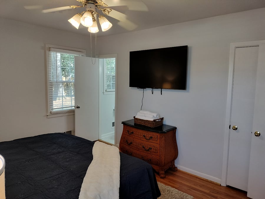 Primary bedroom, King bed, 55" TV, private bath, two closets