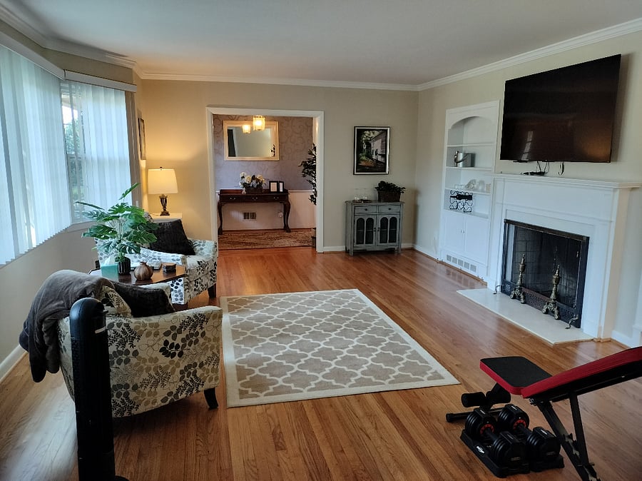 Front R&R room looking back toward the foyer (front fireplace and 65" TV)
