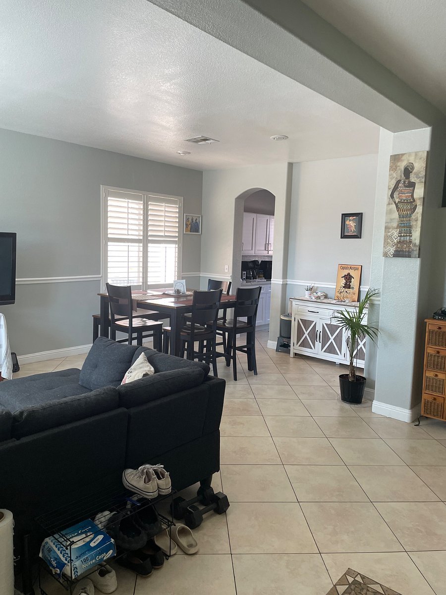 Another view of dining room entering into the kitchen with cabinet space thats used by long-term couple & room tenants.  They are active into cooking for other customers at remote kitchens.