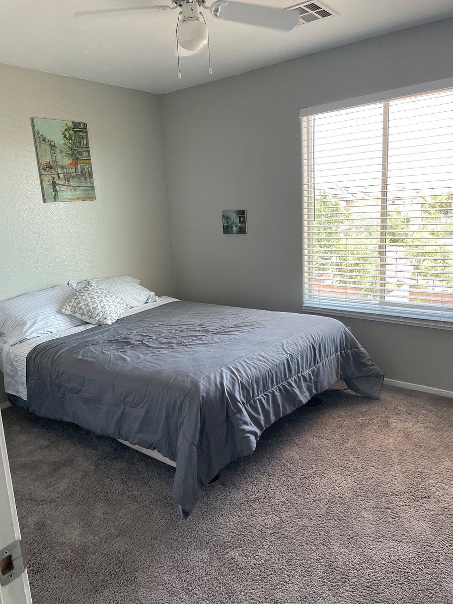 This of you of bedroom number two upstairs and has a shared bathroom with another couple. They have been here for over a year. The bathroom has two sinks, a full bathroom with a bathtub and shower.