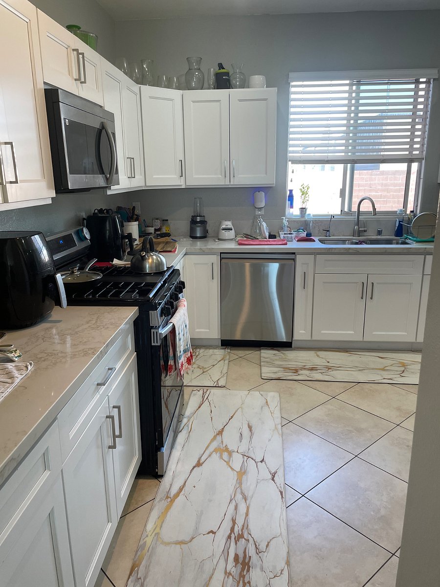 Another view of  kitchen with dishwasher, faucet sink, and alkaline water faucet. Every one make sure they clean the stove and countertops off when using them