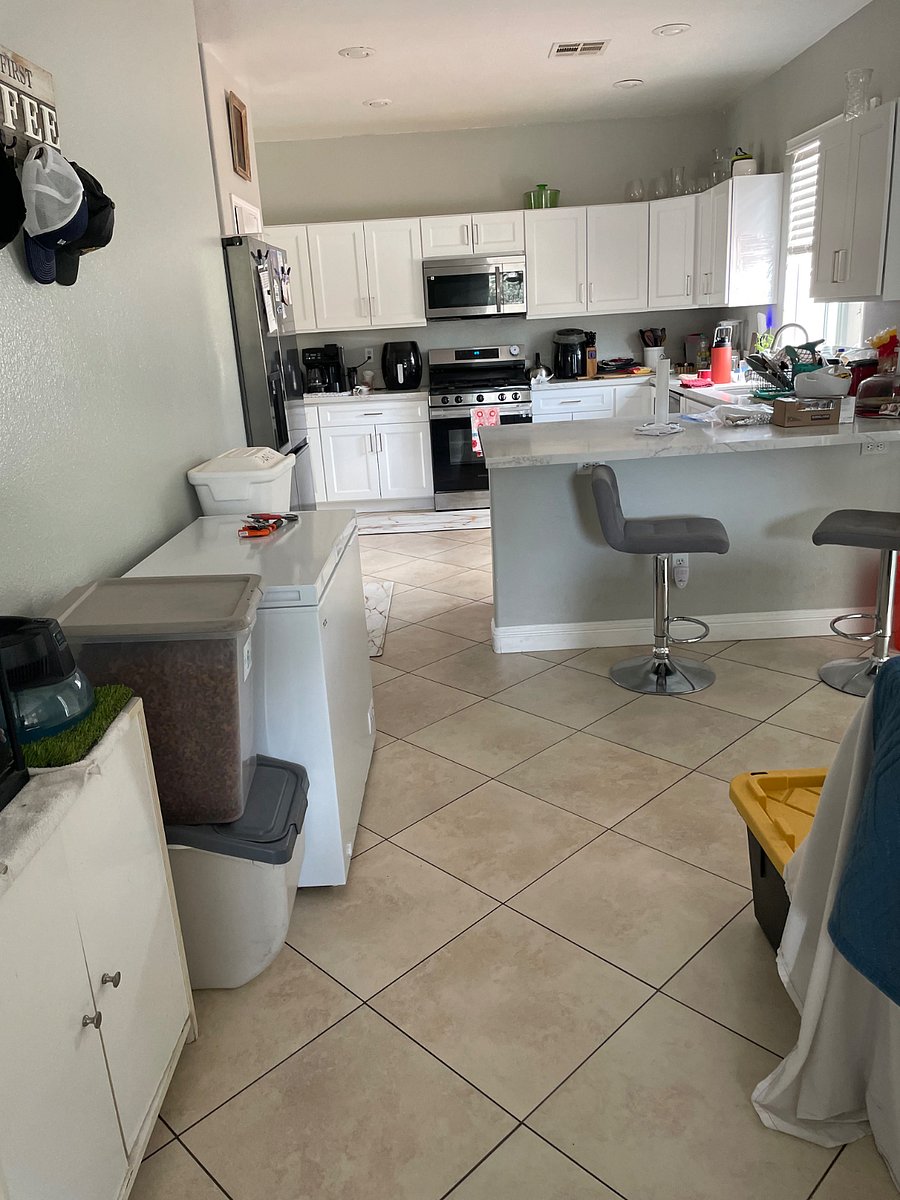 This view of the kitchen, youll see a large freezer at for freezing items which can be used for storing frozen foods besides using the double door fridge, refrigerator and freezer