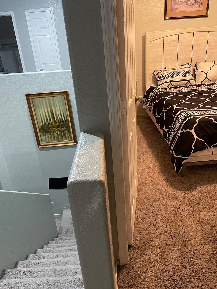 Upstairs view of bedroom, number two upon entering at the top of the stairs you just turn left