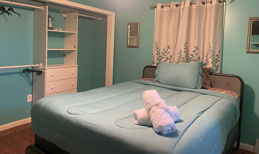 Bedroom 1: First Floor, Queen with two closets and two dressers, Large-Screen TV.