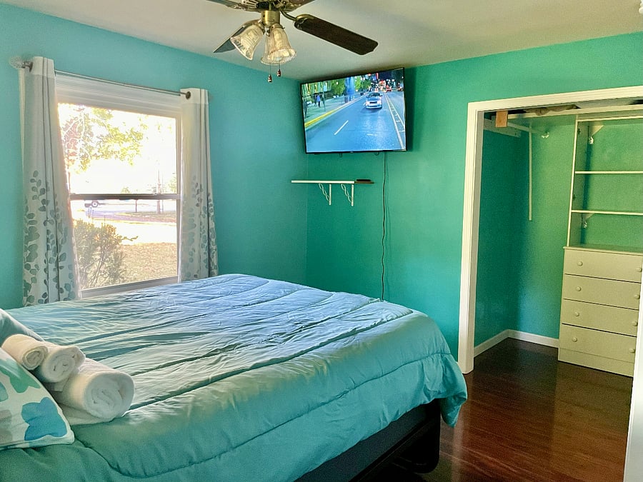 Bedroom 1: First Floor, Queen with two closets and two dressers, Large-Screen TV.