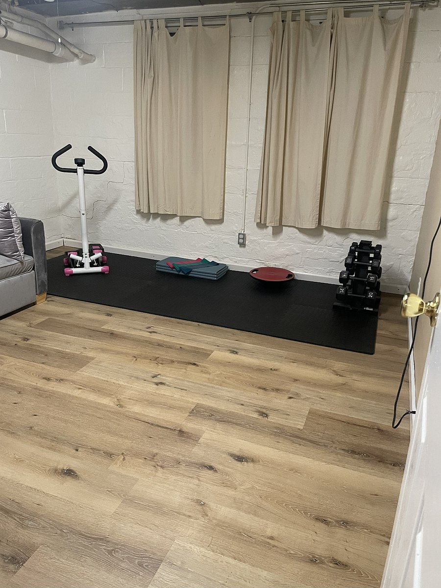 Basement.Exercise room with Smart TV and room for virtual classes.