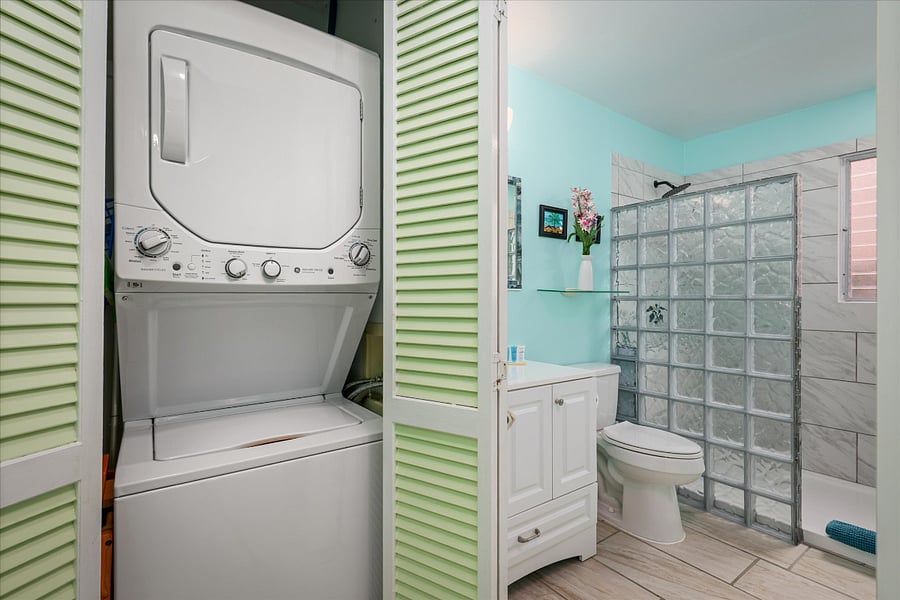 In unit washer and dryer next to guest bathroom