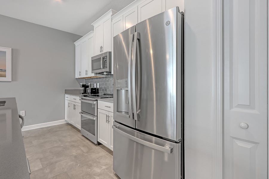 Fully equipped modern kitchen with new appliances. 