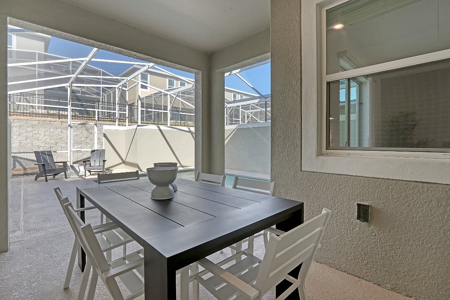 Covered patio perfect for shaded outdoor meals. 