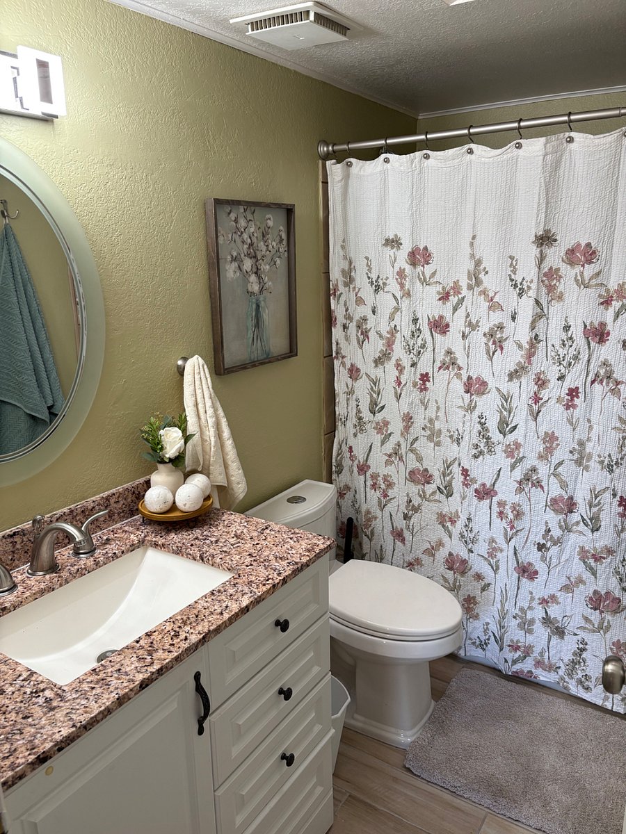Full bath with full shower and tub