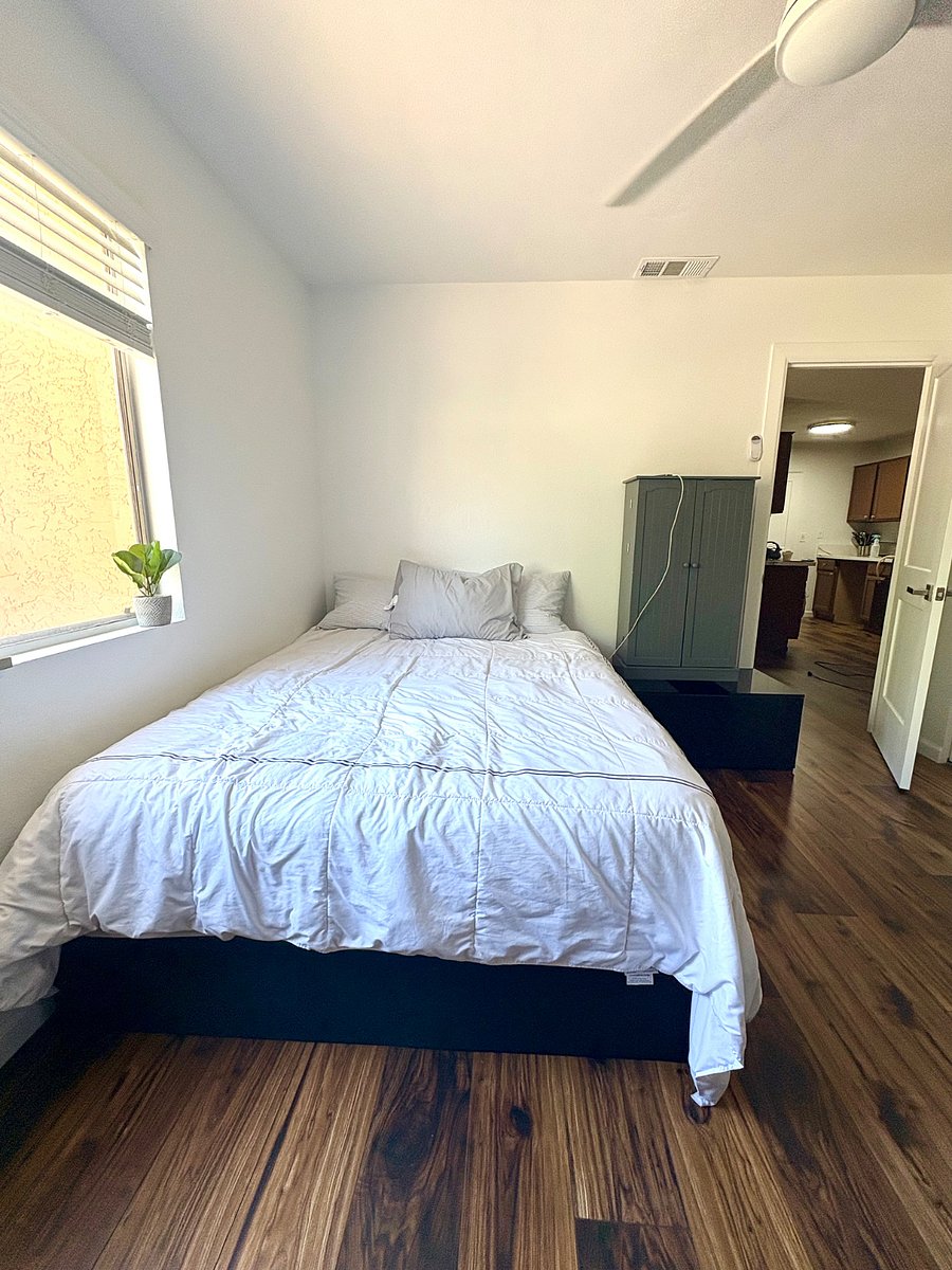 Queen bed in adult room