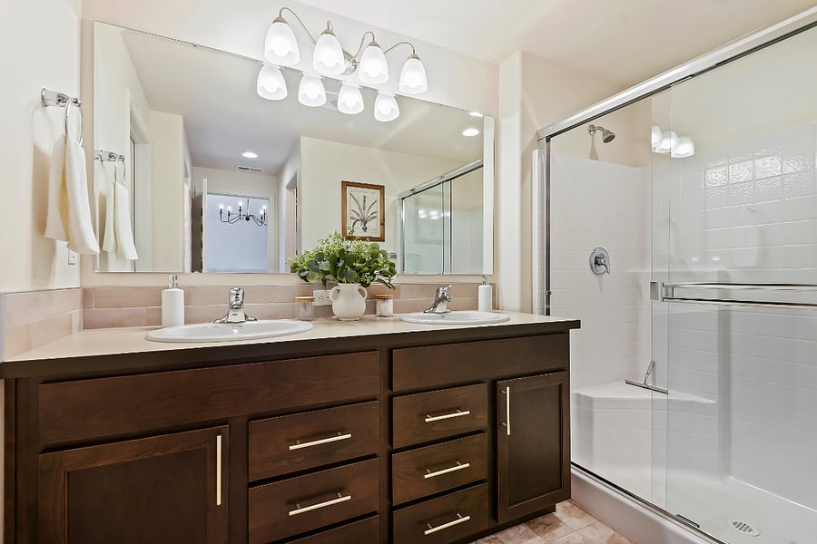 separate toilet room with door to the left. Primary bathroom en-suite to bedroom.