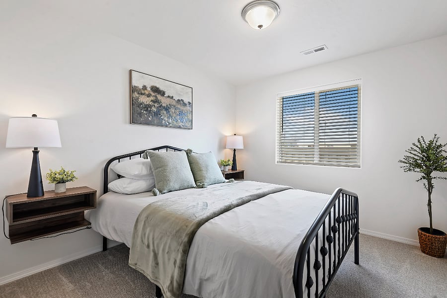 bedroom 3. Queen bed, memory foam cooling mattress, white sheets.