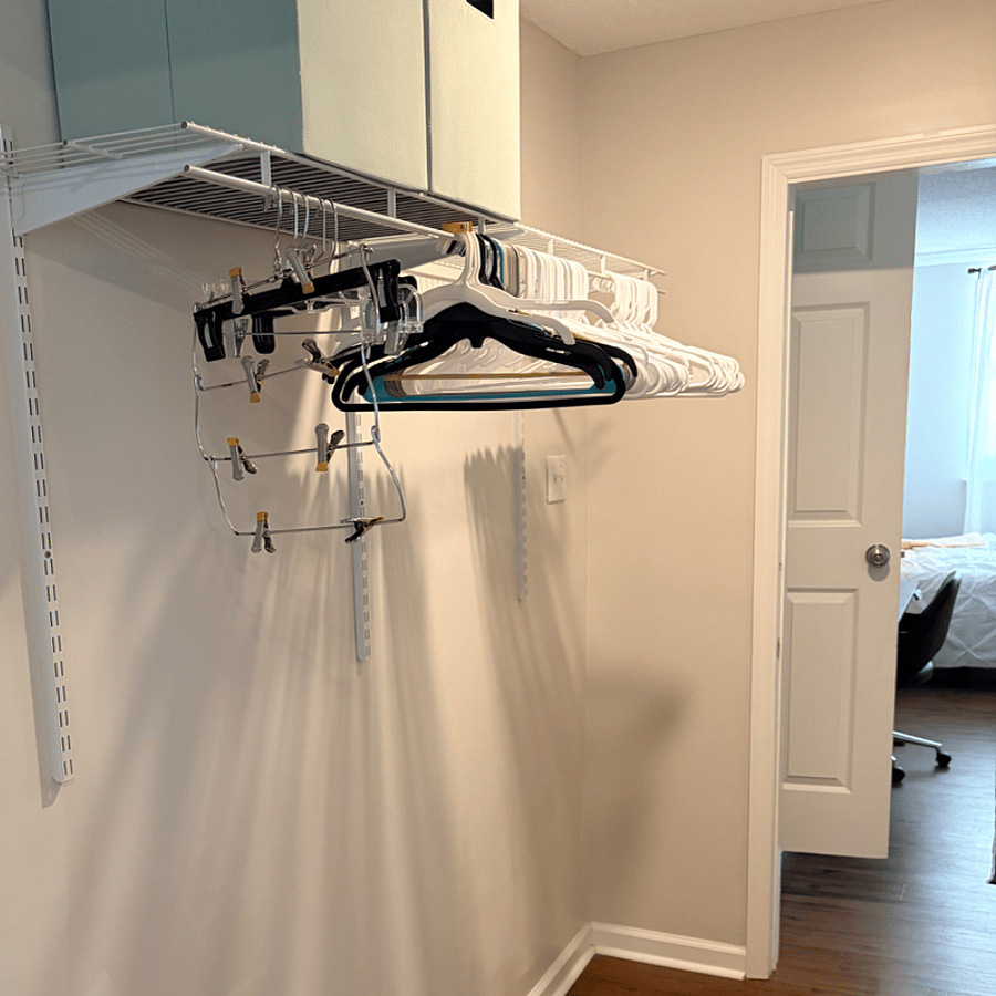 Walk through closet for private bedroom