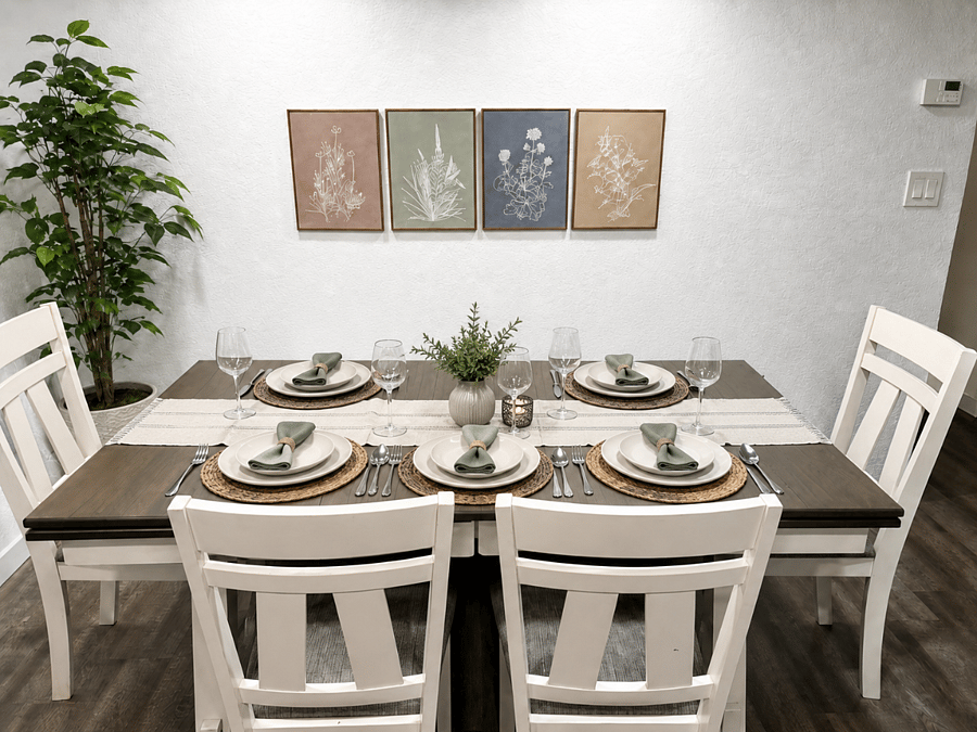 A welcoming dining space set for six, perfect for sharing a meal, gathering together, and evenings that unfold around the table.