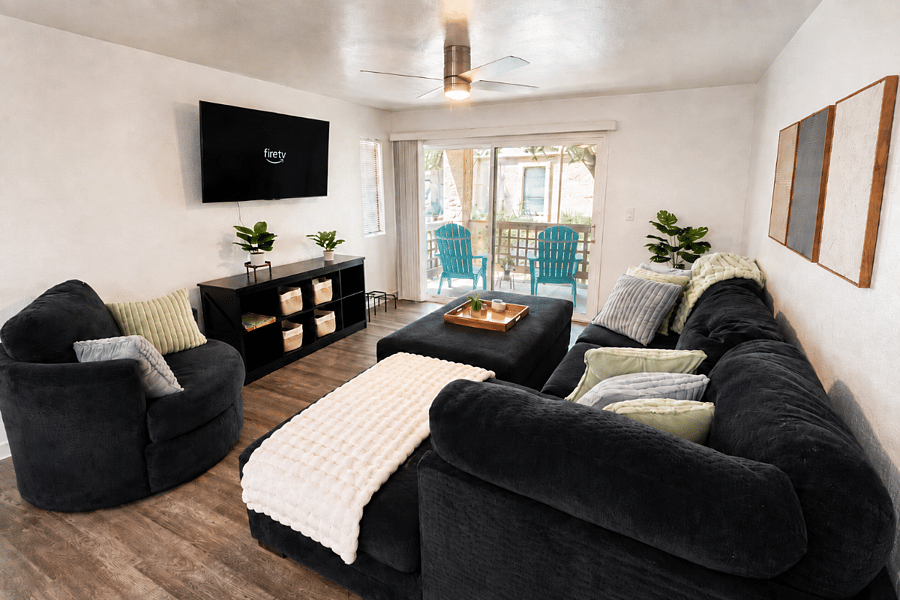 Stretch out on the large sectional, settle in for a movie, or enjoy a quiet evening in front of the mounted smart TV.