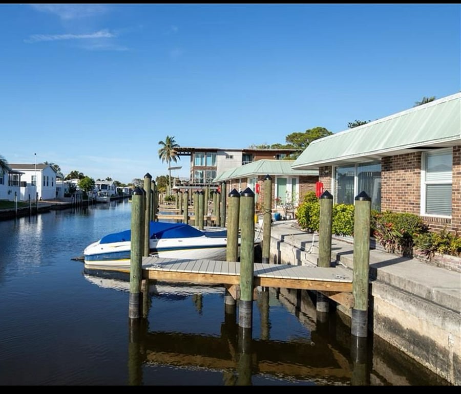 Designated boat slip accommodates up to 20' vessel. No bridges to gulf.