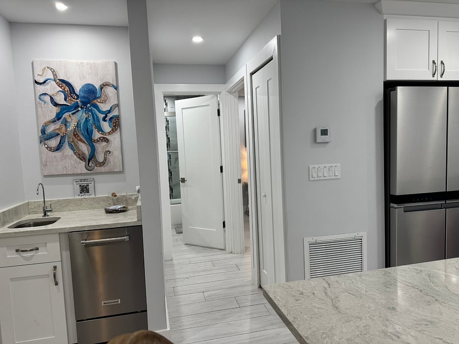 Access door to guest bathroom. When closed and locked the private door from the bedroom to bathroom makes en suite.