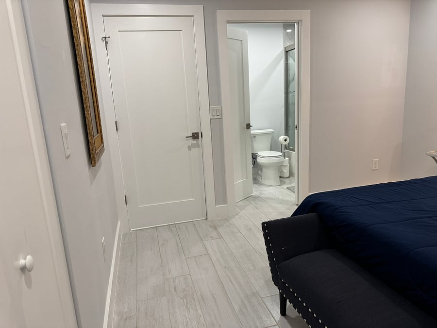 Door into bathroom from bedroom.